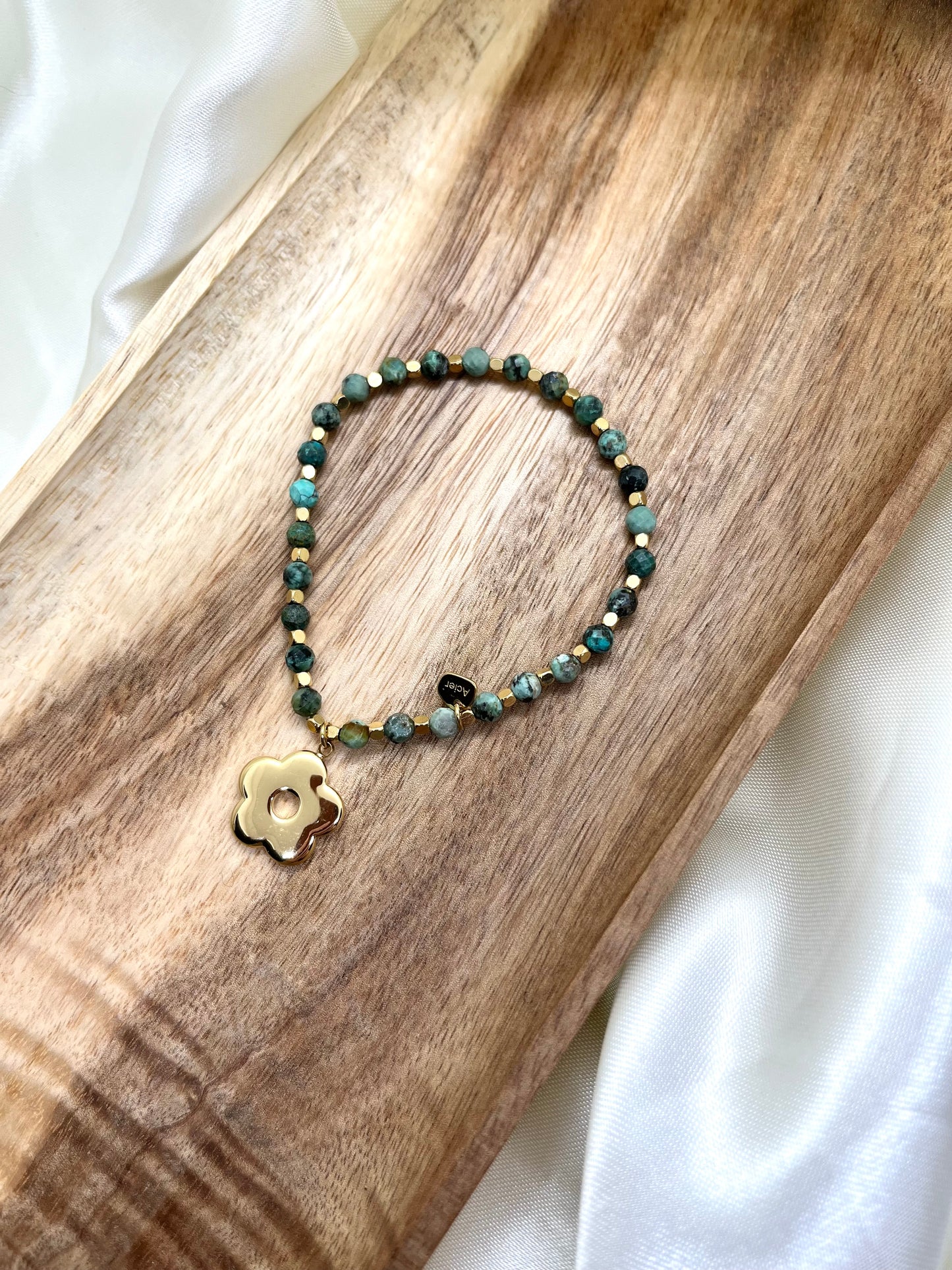 Bracelet doré et vert fleur - Turquoise Africaine