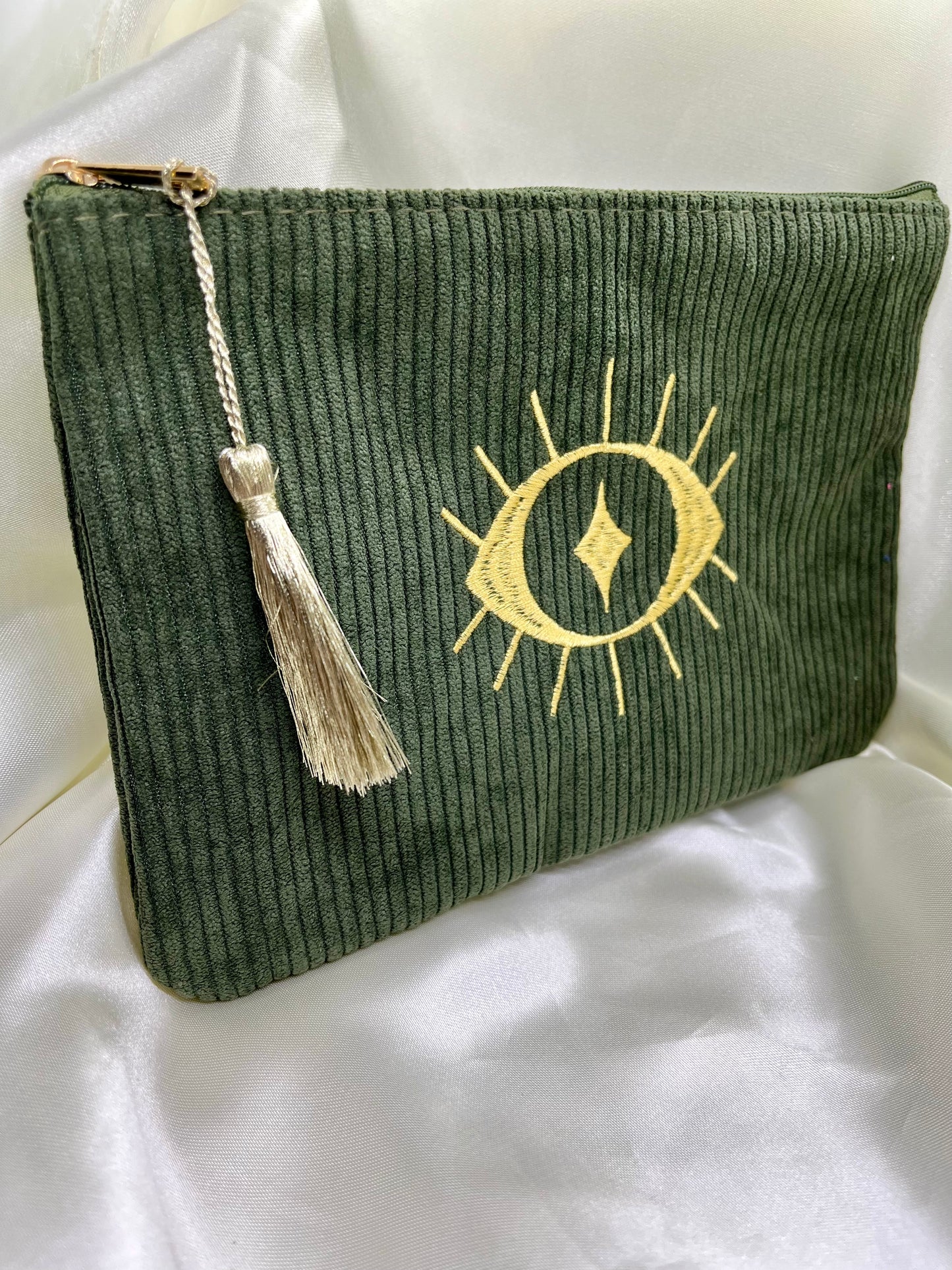 Pochette kaki œil doré