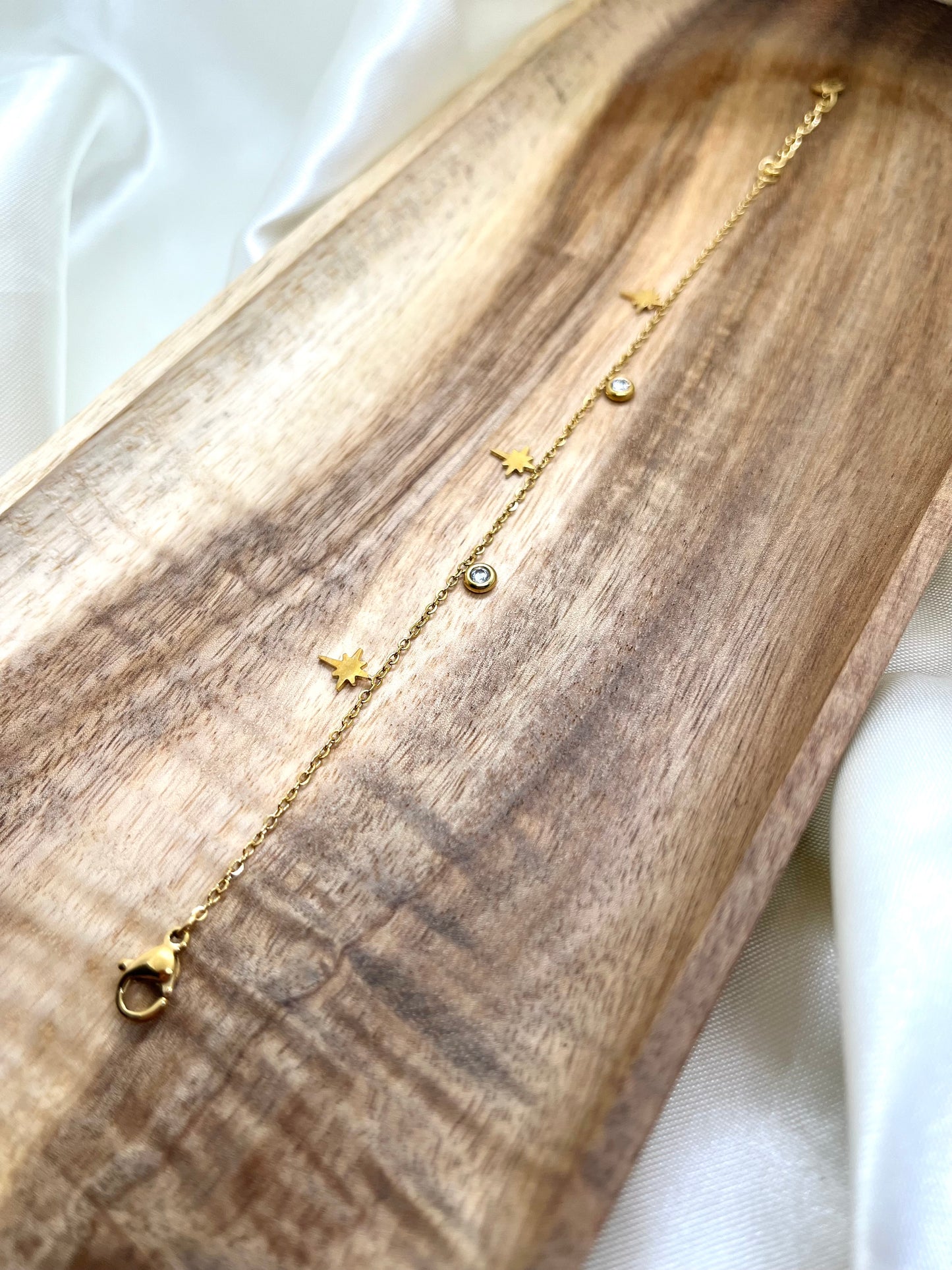 Bracelet doré étoiles et strass