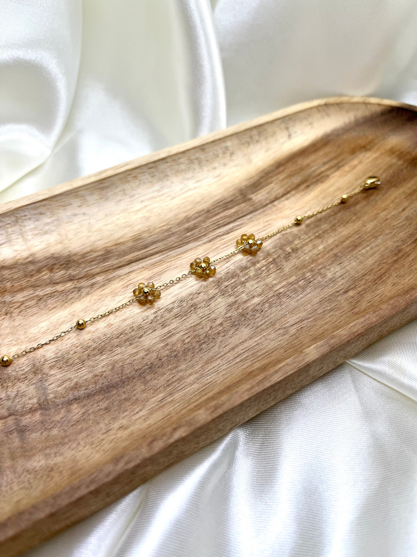 Bracelet doré petites fleurs