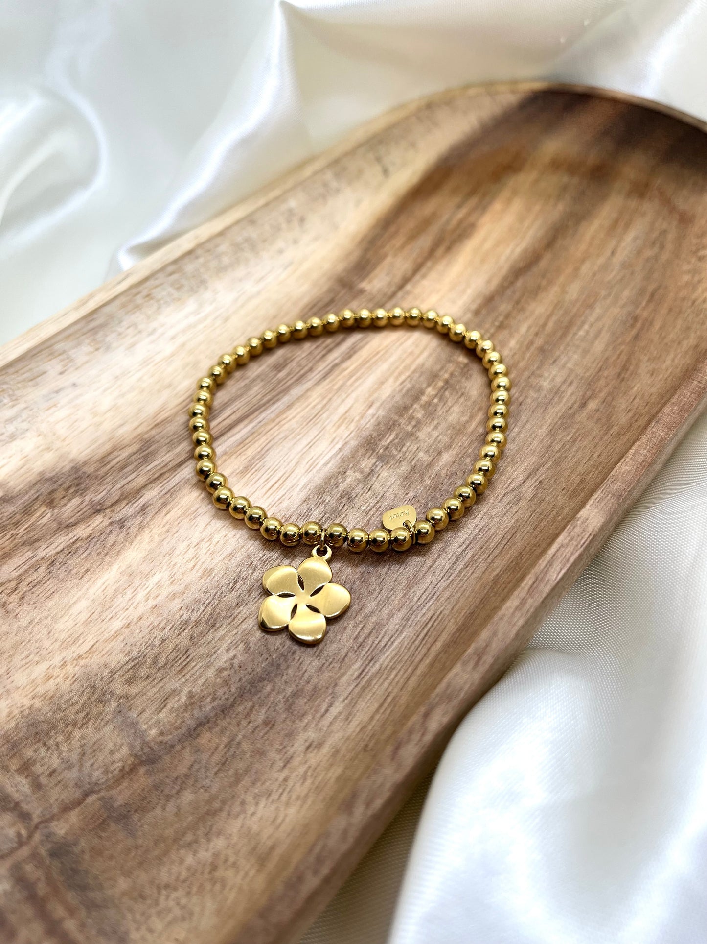 Bracelet doré fleur