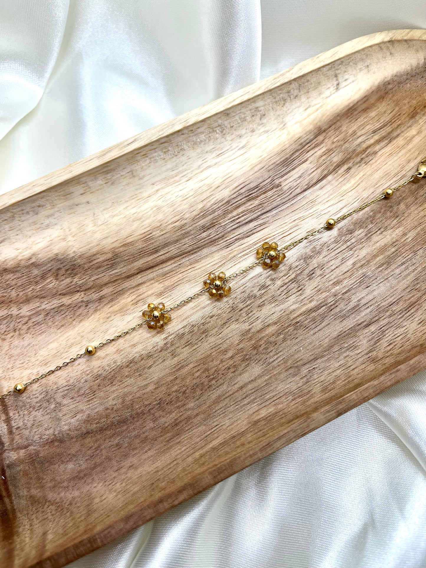 Bracelet doré petites fleurs