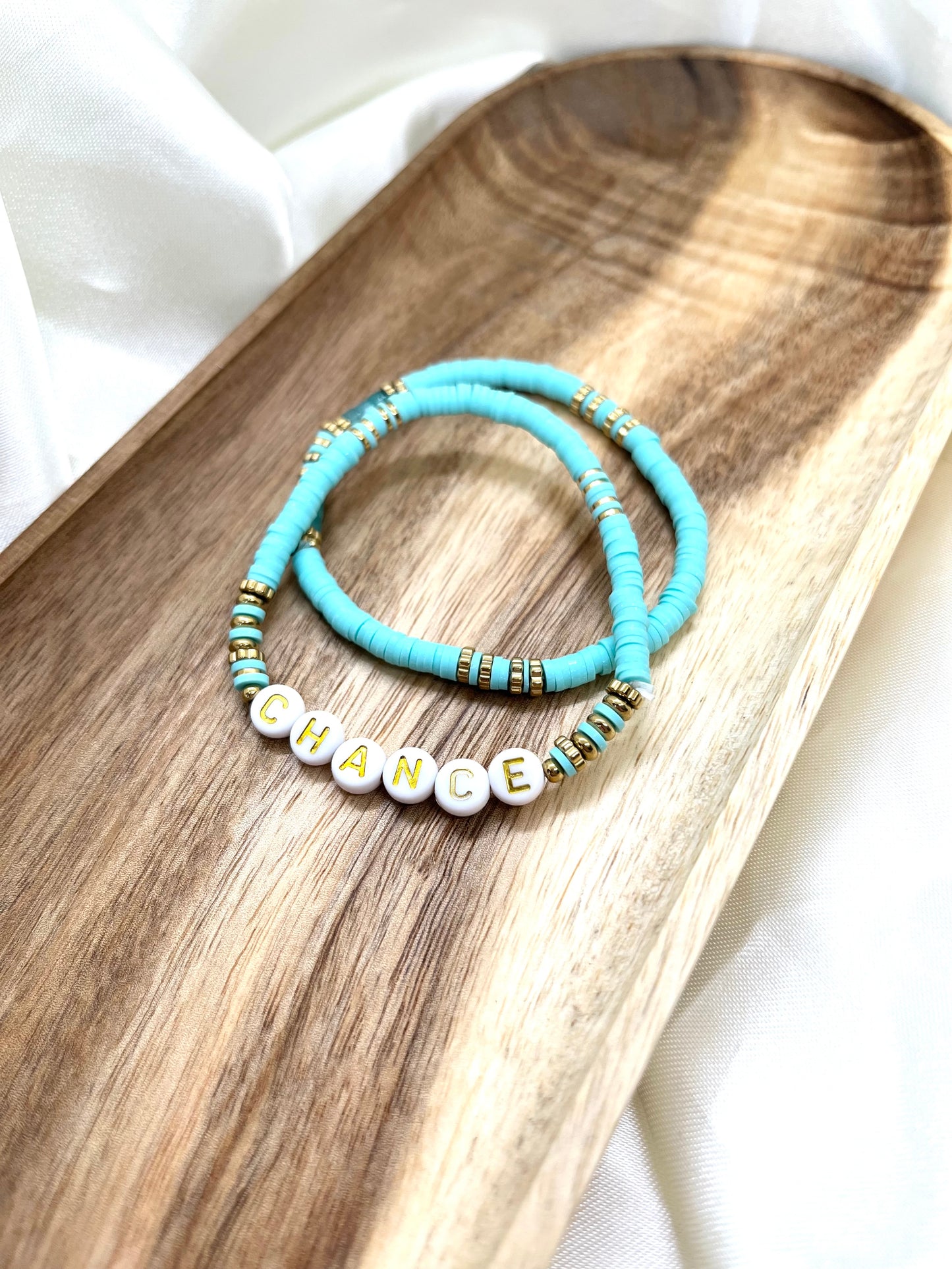 Bracelets turquoise, blanc et doré Chance