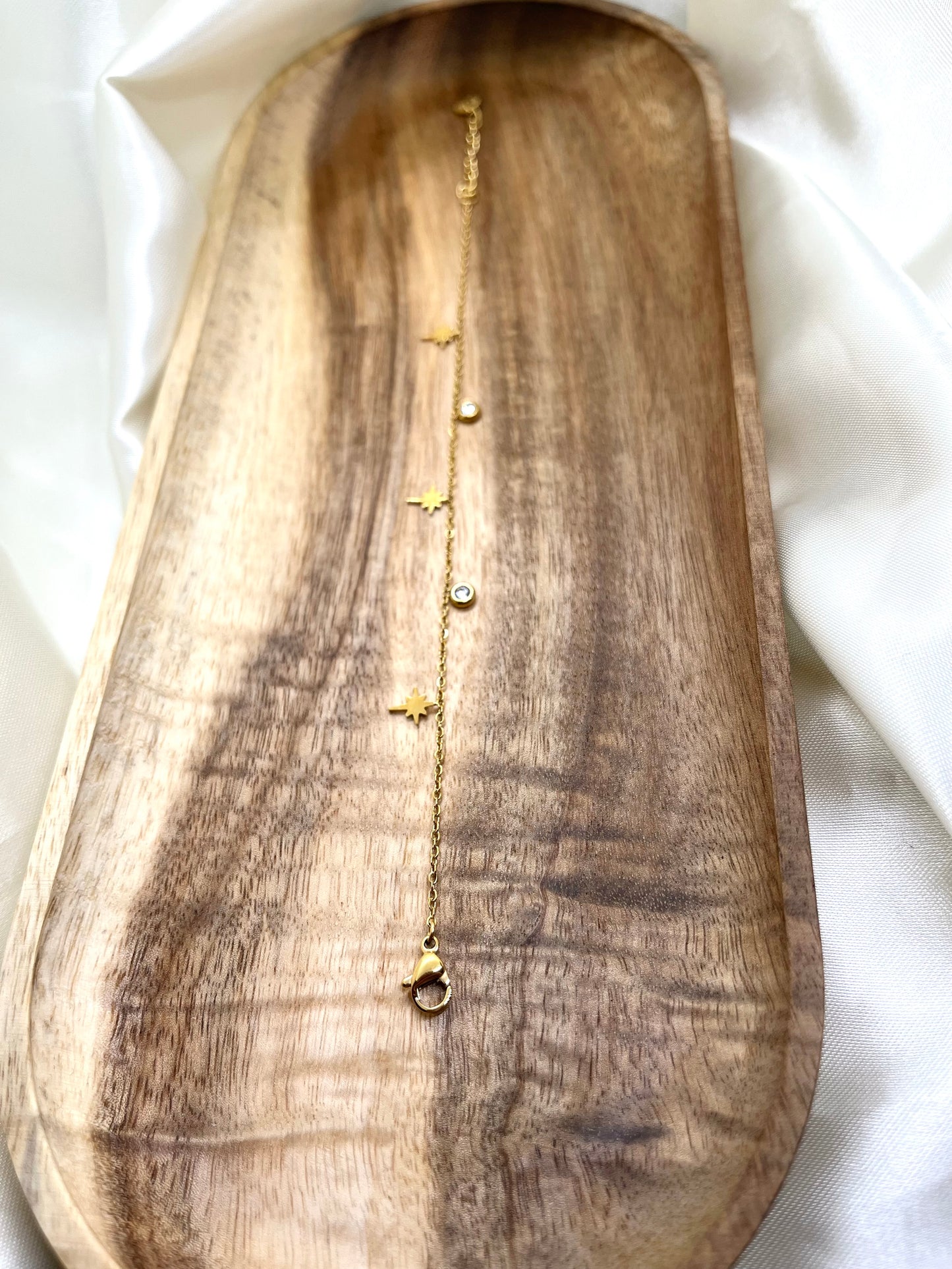Bracelet doré étoiles et strass