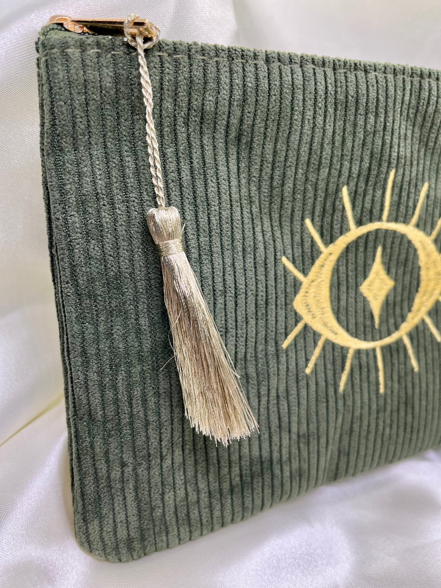 Pochette kaki œil doré