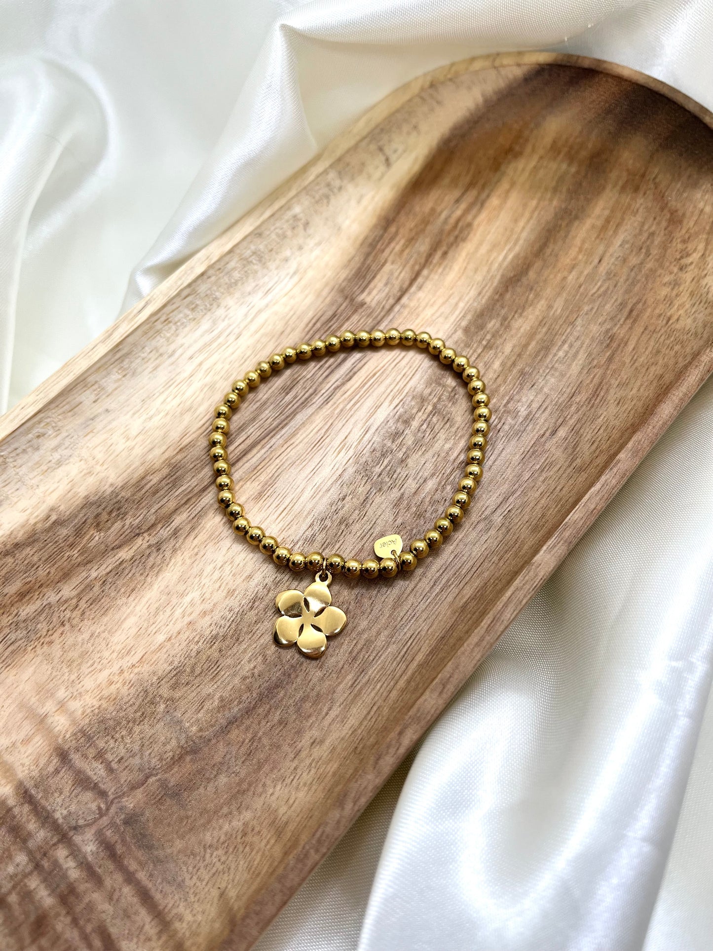 Bracelet doré fleur