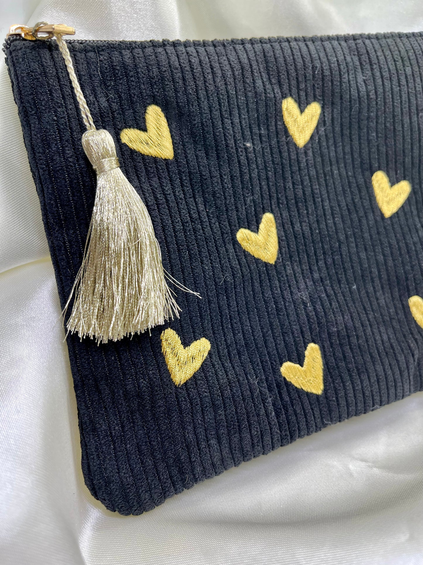 Pochette noire & cœurs doré