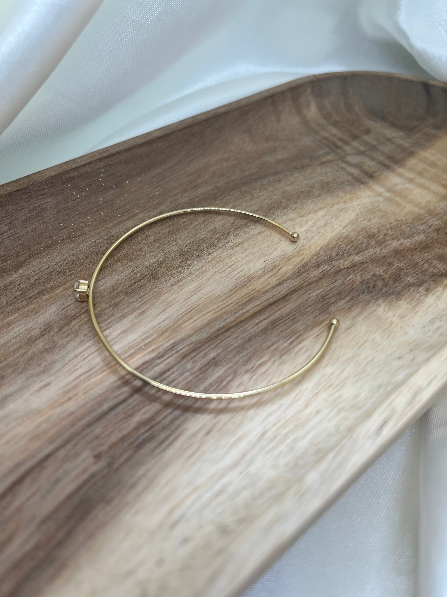 Bracelet jonc fin doré et strass
