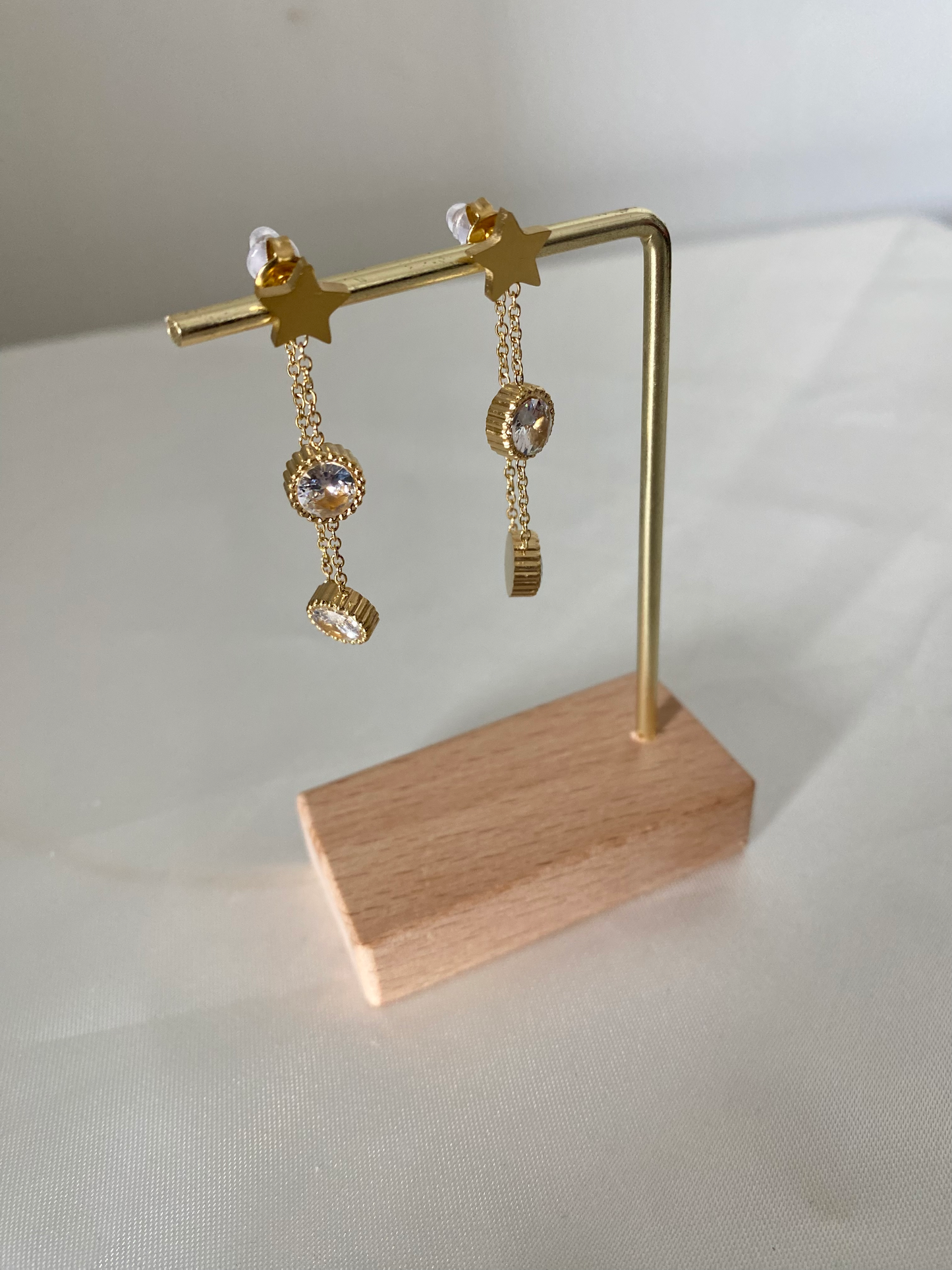 Boucles d'oreilles doré et strass Dota