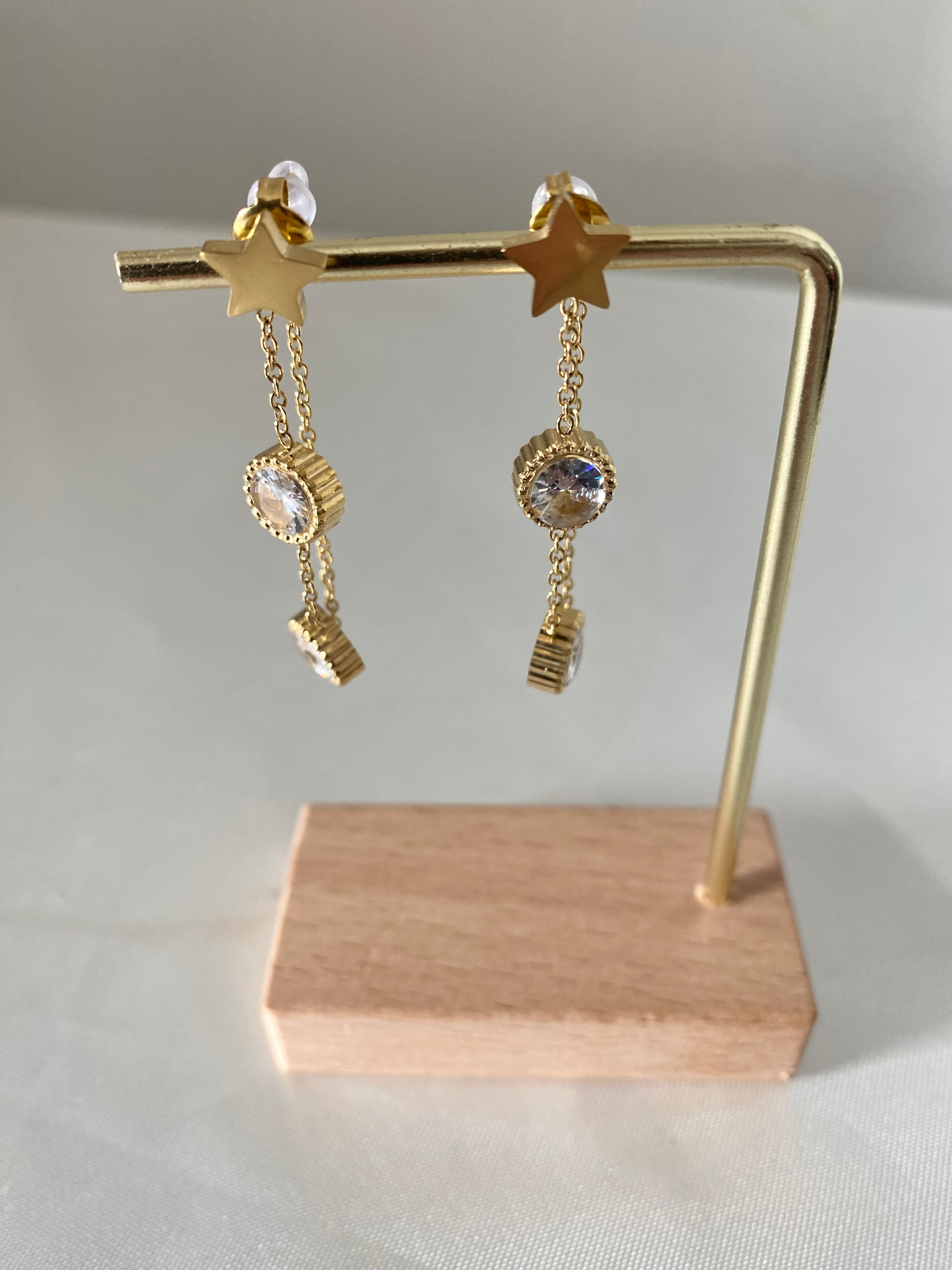 Boucles d'oreilles doré et strass Dota