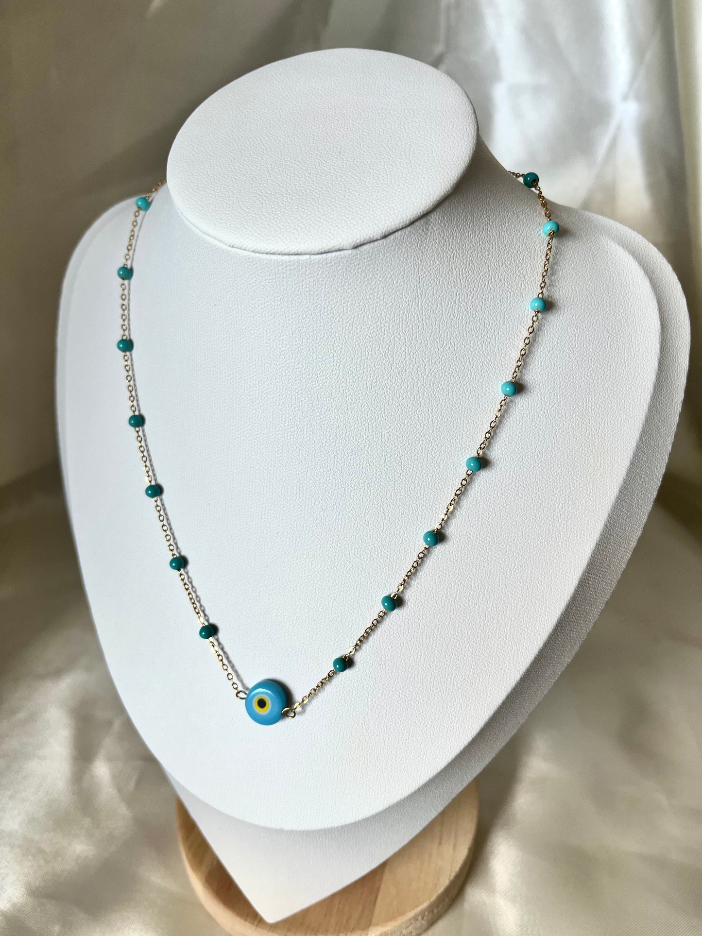 Collier doré et perles bleu Eros