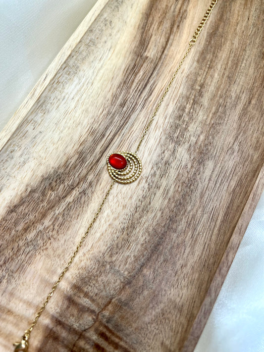 Bracelet doré et rouge