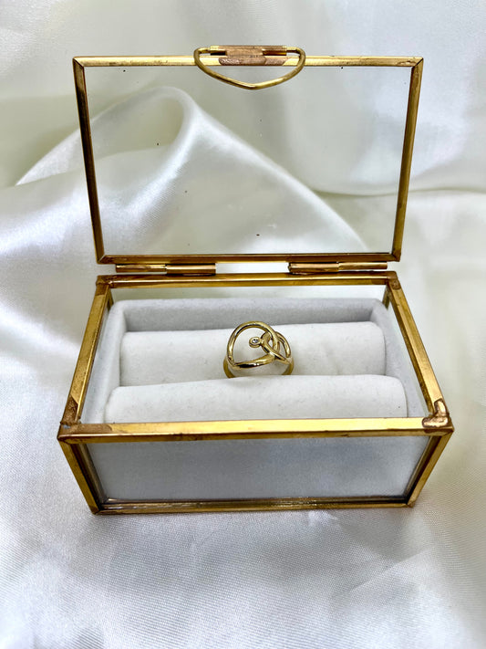 Bague dorée et strass ovale