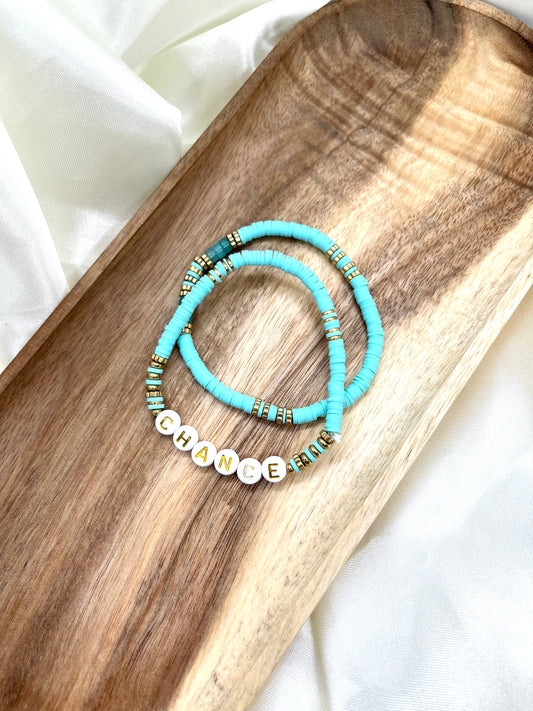 Bracelets turquoise, blanc et doré Chance