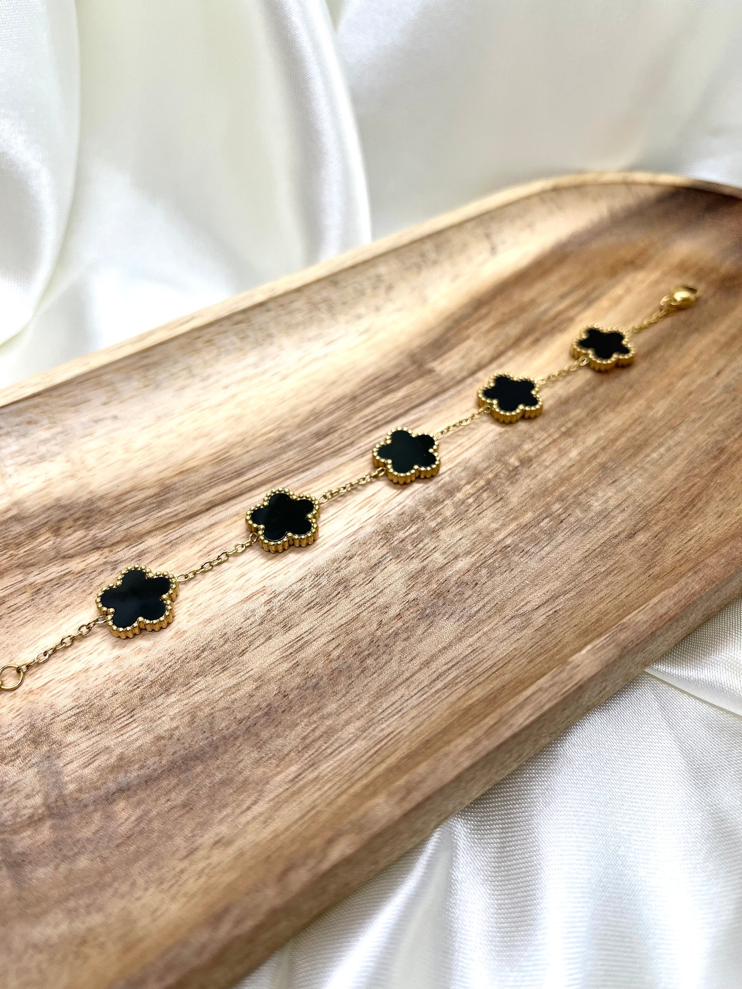 Bracelet doré fleurs noir