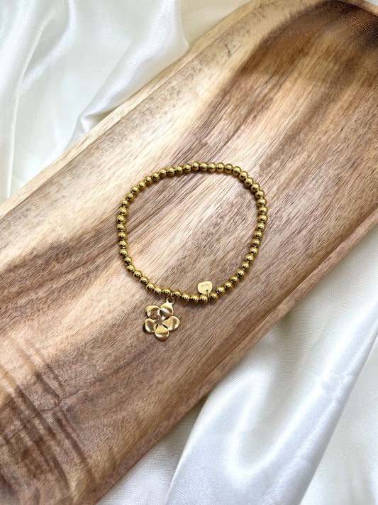 Bracelet doré fleur