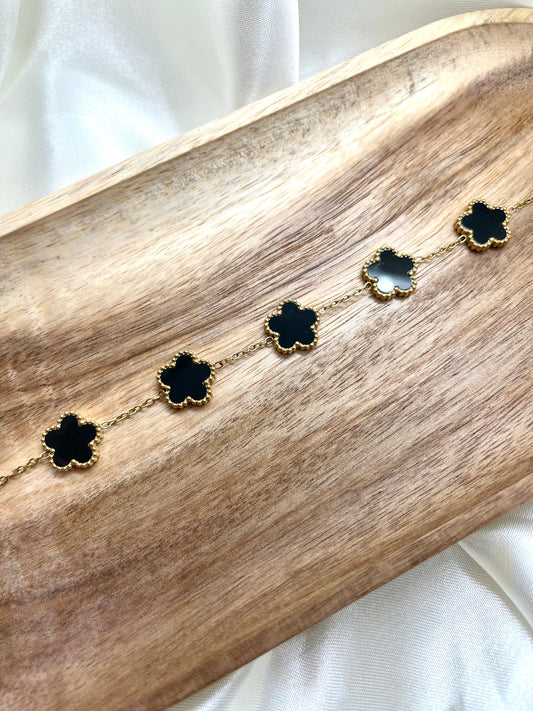 Bracelet doré fleurs noir