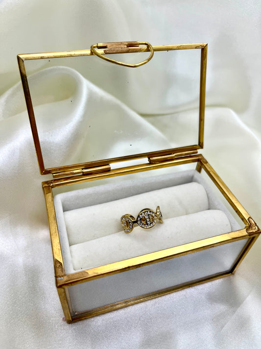 Bague dorée et strass maille marine
